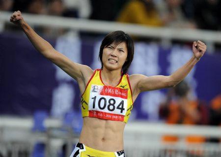 Wang&nbsp;Jing&nbsp;of&nbsp;Fujian&nbsp;Province&nbsp;celebrates&nbsp;after&nbsp;winning&nbsp;the&nbsp;final&nbsp;of&nbsp;women's&nbsp;100m&nbsp;sprint&nbsp;at&nbsp;the&nbsp;11th&nbsp;Chinese&nbsp;National&nbsp;Games&nbsp;in&nbsp;Jinan,&nbsp;east&nbsp;China's&nbsp;Shandong&nbsp;Province,&nbsp;October&nbsp;22,&nbsp;2009.&nbsp;[File&nbsp;photo:Xinhua]