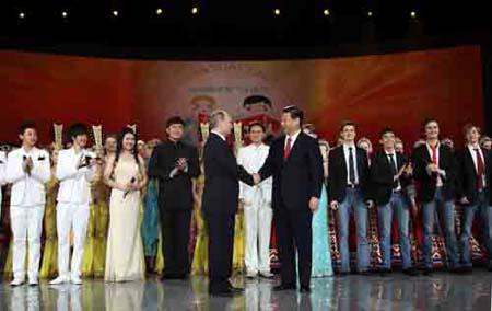 Chinese&nbsp;Vice&nbsp;President&nbsp;Xi&nbsp;Jinping&nbsp;(front&nbsp;R)&nbsp;and&nbsp;Russian&nbsp;Prime&nbsp;Minister&nbsp;Vladimir&nbsp;Putin&nbsp;(front&nbsp;L)&nbsp;shakes&nbsp;hands&nbsp;after&nbsp;the&nbsp;opening&nbsp;ceremony&nbsp;of&nbsp;the&nbsp;"Year&nbsp;of&nbsp;Chinese&nbsp;Language"&nbsp;in&nbsp;the&nbsp;Kremlin&nbsp;in&nbsp;Moscow,&nbsp;capital&nbsp;of&nbsp;Russia,&nbsp;March&nbsp;23,&nbsp;2010.&nbsp;Visiting&nbsp;Chinese&nbsp;Vice&nbsp;President&nbsp;Xi&nbsp;Jinping&nbsp;and&nbsp;Russian&nbsp;Prime&nbsp;Minister&nbsp;Vladimir&nbsp;Putin&nbsp;attended&nbsp;the&nbsp;opening&nbsp;ceremony&nbsp;of&nbsp;the&nbsp;"Year&nbsp;of&nbsp;Chinese&nbsp;Language"&nbsp;here&nbsp;on&nbsp;Tuesday.&nbsp;(Xinhua/Lan&nbsp;Hongguang)&nbsp;