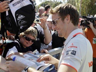 McLaren&nbsp;Formula&nbsp;One&nbsp;driver&nbsp;Jenson&nbsp;Button&nbsp;of&nbsp;Britain&nbsp;signs&nbsp;autographs&nbsp;as&nbsp;he&nbsp;arrives&nbsp;at&nbsp;the&nbsp;Albert&nbsp;Park&nbsp;Circuit&nbsp;in&nbsp;preparation&nbsp;for&nbsp;the&nbsp;Australian&nbsp;Formula&nbsp;One&nbsp;Grand&nbsp;Prix&nbsp;in&nbsp;Melbourne,Thursday,&nbsp;March&nbsp;25,&nbsp;2010.&nbsp;The&nbsp;seasons&nbsp;second&nbsp;race&nbsp;will&nbsp;be&nbsp;held&nbsp;here&nbsp;on&nbsp;Sunday&nbsp;March&nbsp;28.(AP&nbsp;Photo/Rob&nbsp;Griffith)